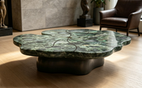 Table basse de luxe en pierre de style italien moderne, motif feuille de lotus, en marbre vert naturel, écologique, pour grande villa et salon.