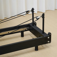 Lits de Pilates pliables portables de luxe, équipement de gym pliable, reformer en bois pliable beige