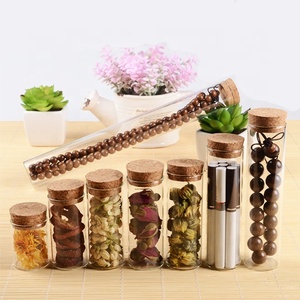 Wholesale High Quality Hand Blown Circle Mini Glass <b>Bottles</b> with Lid and <b>Cork</b> for Kitchen Food Storage Freshness Preservation - Product Image 1