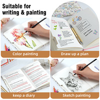 Carnet A5 en similicuir avec sangle décorative ; Pages intérieures quatre-en-un ; Pages vierges à points ; Cadeau personnalisé