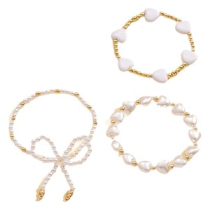 European and American cross-border elegant and versatile heart-shaped faux pearl <b>bracelet</b> four-piece <b>set</b> with bow stacking - Product Image 5