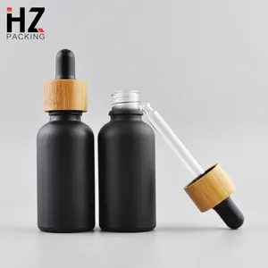 Rỗng 30 ml 1 oz lớp biểu bì mỹ phẩm tóc chai tinh dầu 30 ml Frosted kính màu đen chai nhỏ giọt với nắp tre hàng đầu