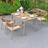 Ensemble de salle à manger d'extérieur de luxe, grande table extensible en aluminium, fauteuils de patio en corde tressée, modernes