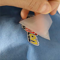 Designs sérigraphiés personnalisés bon marché Plastisol Fer à repasser sur les papiers d'étiquettes de vêtements Étiquette d'impression par transfert de chaleur arrière pour T-shirts