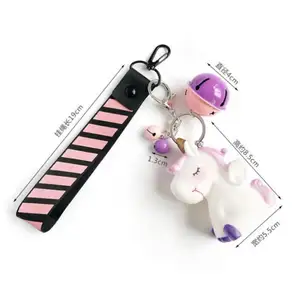 Porte-clés pendentif de sac pour dames Boule en peluche pelucheuse Pom pom artificiel Porte-clés licorne rose Boule de cheveux licorne pompon porte-clés en peluche