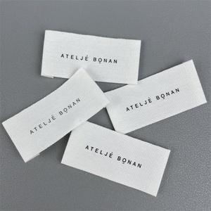 Etichette Tessute Dirette dalla Fabbrica per Abbigliamento in Cotone Gros Grain con Trama Dorata - Product Image 1