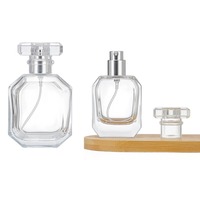 Fabrication sur mesure de flacons de parfum vides en verre transparent, écologiques et économiques, 30 ml, 50 ml, 100 ml, avec bouchon argenté et impression sérigraphique.