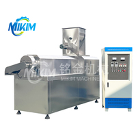 Extrusion automatique d'aliments pour poissons à double vis de type sec Machine de fabrication de flocons de maïs Machines de production Extrudeuse d'aliments pour animaux de compagnie chiens chats