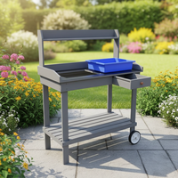Banc de jardinage mobile en bois avec tiroir, roulettes et plateau de plantation, poste de travail extérieur pour la plantation avec étagère de rangement