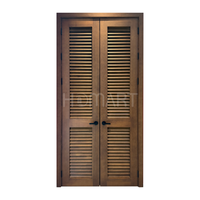 Porte intérieure à double volet avec finition grain de bois, volet de ventilation à lattes complètes, porte double battante en bois