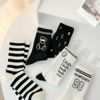 Fabricant OEM en gros de chaussettes de sport en coton blanc et noir, design unisexe, personnalisation avec votre propre logo, chaussettes de sport à tube