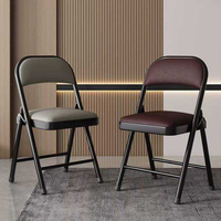 Chaise pliante noire de style boutique avec structure métallique pour fêtes et restaurants