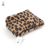 Trousse de maquillage en fausse fourrure à imprimé léopard personnalisée en usine Pochette de beauté de voyage ultra douce de haute qualité