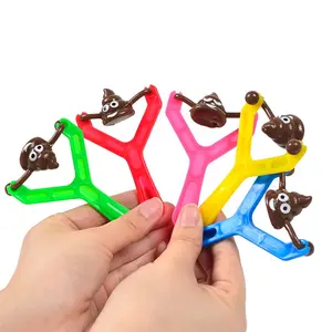 Funny Smiling Poop Face Emoticon Launcher Fidget Toy Novelty Catapult Slingshot Removable Sticky Flying Poop Ejection Kids Toy