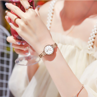 Montre à quartz pour femme, luxe moderne, directement de l'usine, avec verre, bracelet en acier inoxydable, lunette sertie de diamants, aiguilles en forme de feuille, date et fermoir papillon