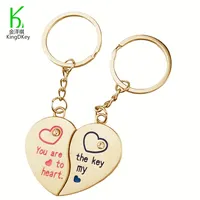 יצרן מתכת פליז מותאם אישית קסם Knuckles Keyring לוגו עשה שבור מותאם אישית לב ברונזה Keychain לזוגות