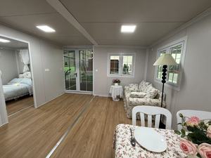 Hiện đại 20ft ngà trắng thép prefab container nhà kính lớn cửa ra vào tương lai thiết kế tối giản di động triển khai có thể gập lại - Product Image 6