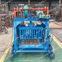 Machine de fabrication de briques creuses et pleines en béton, contrôlée par PLC, à interverrouillage automatique, ligne de production de blocs multifonctionnelle