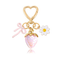 Adorable porte-clés 3D fraise, style rouge, rose, violet, avec nœud et pendentif fleur perle, breloque créative pour sac, cadeau idéal pour les amis