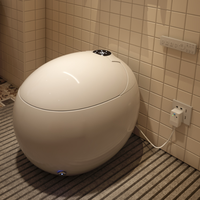 Nouvelle conception de toilette intelligente en forme d'œuf, WC automatique en céramique à poser au sol pour salle de bain