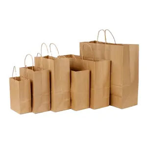 Sac d'emballage en papier personnalisé en gros boutique de cadeau shopping de luxe sac en papier kraft avec votre propre logo