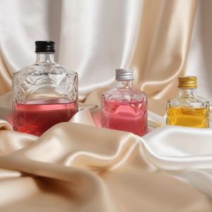 Wholesale 50ml 100ml Empty <strong>Mini</strong> Round Shaped Glass <strong>Bottle</strong> with Gold Screw Cap for Whiskey Brandy and Spirits - Product Image 2