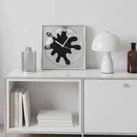 Nouvelle horloge murale abstraite en métal de style nordique, rétro, haut de gamme, tendance, design Bauhaus silencieux pour salon