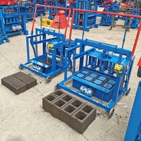 Machine automatique pour la fabrication de briques, plastique et béton
