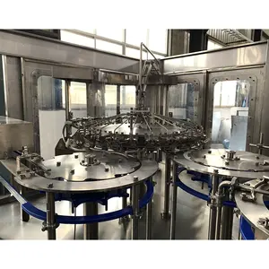 Machine de remplissage carbonatée par soude automatique fiable de l'eau de boissons de longue durée de vie du produit chaud 6000BPH