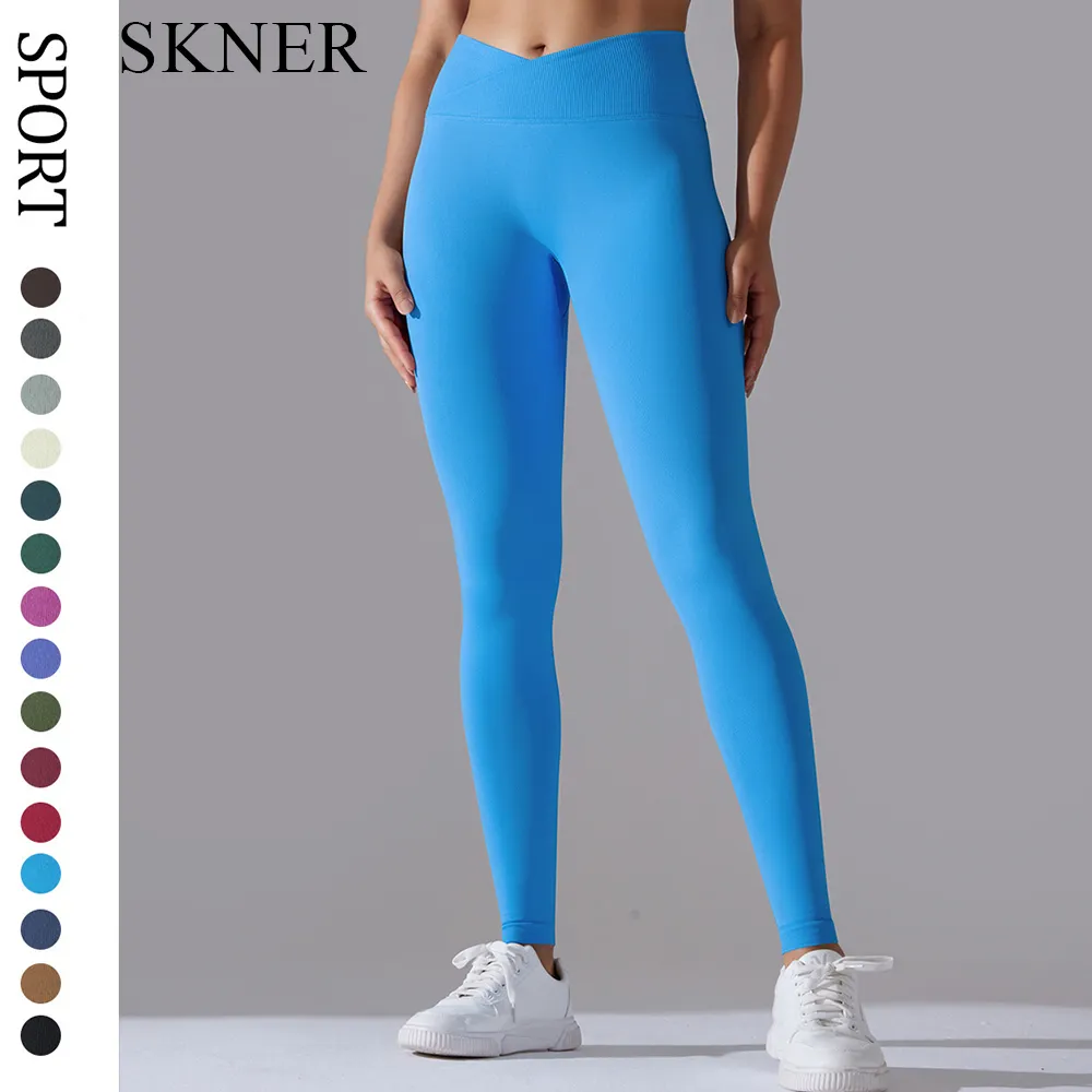 SKNER Pantalon de yoga pour femmes côtelé sans couture entraînement taille haute croisé bas de cloche Leggings d'exercice respirant Logo personnalisé