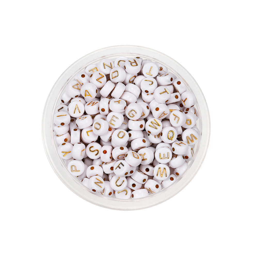 Round white and gold English beads
