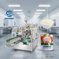 Machine de conditionnement rotative pour sachets préformés à bec verseur pour sauces, jus, liquides visqueux et pâtes