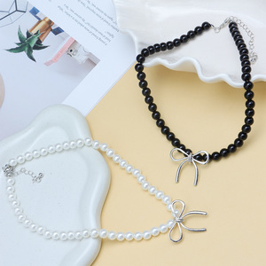 สร้อยคอโชคเกอร์มุกเทียมสำหรับผู้หญิงพร้อมดีไซน์โบว์สีขาวและสีดำเครื่องประดับแฟชั่นสวมใส่ทุกวัน - Product Image 2
