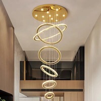 Lustre en cristal LED de luxe à anneaux, style moderne, pour décoration intérieure, hall d'hôtel, escalier, villa