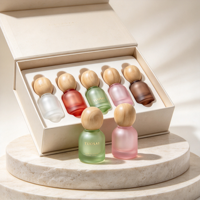 Flacons compte-gouttes en verre givré de luxe de 10 ml avec boîte cadeau haut de gamme sérigraphiée pour ensemble d'huiles essentielles et de soins de la peau