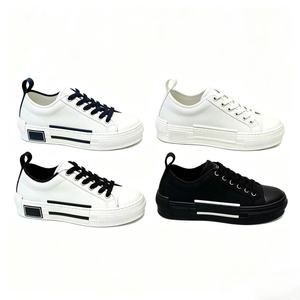 Baskets blanches et noires en PU à lacets avec semelle extérieure en caoutchouc, bout rond, chaussures décontractées pour toutes les saisons - Product Image 1
