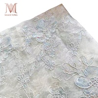 Tissu en dentelle d'organza 100% nylon brodé de fleurs de style national à double couche pour vêtements de couture féminins