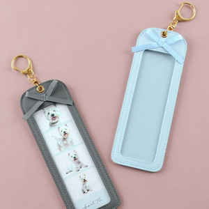 Korean style PU <b>leather</b> pet photo <b>keychain</b>, cute long four-grid DIY photo clip, couple photo pendant - Product Image 2
