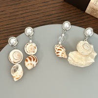 Ensemble collier et boucles d'oreilles en acier inoxydable plaqué or 18 carats avec coquillages coniques hébraïques naturels de Hawaï et perles Conus Ebraeus pour mariage et fête