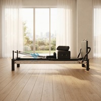 Reformer de Pilates Commercial Noir et Blanc à Cadre en Aluminium avec Barre de Pied Coulissante – Machine de Fitness pour Studio de Pilates
