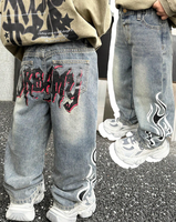 Jeans amples en denim bleu style vintage vieilli pour jeune garçon, avec imprimé graffiti ours mignon, collection automne-hiver