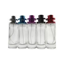 Vente en gros de flacons de parfum en verre de 30 ml avec couvercle rond en plastique UV coloré et pulvérisateur à pompe, vides et rechargeables