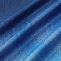 Ensemble d'uniformes de football personnalisés en polyester à motif marbré cyan marine, imprimés par transfert thermique, séchage rapide, vente en gros