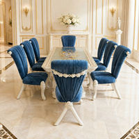 Ensemble de salle à manger haut de gamme 8 places avec chaises en velours blanc sculptées et incrustations florales colorées pour villa