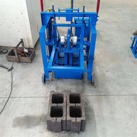Petite machine manuelle de fabrication de briques en blocs de ciment T200 pour la ponte des œufs à vendre en Ouganda