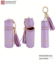 Pochette de rangement cylindrique de luxe avec pompon et porte-clés, mini pochette portable en cuir PU pour usage quotidien