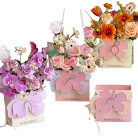 Boîte cadeau florale de luxe faite à la main, portable et pliable, avec motif floral et estampage sur papier couché pour le transport des fleurs