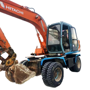 Excavatrice Hitachi EX100 10T d'occasion la plus vendue, machine sur roues de seconde main avec attache rapide, brise-roche et tarière, certifiée CE - Product Image 1