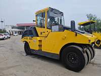 Rouleau compresseur pneumatique BOMAG BW27RH d'occasion 2018 avec poids réglable de 13 à 27 tonnes pour la construction de routes en asphalte