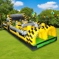 Parcours d'obstacles gonflable géant sur le thème de la construction, jaune et noir à carreaux, en PVC commercial, pour la location de fêtes d'enfants